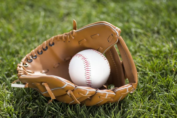 Baseball glove and ball