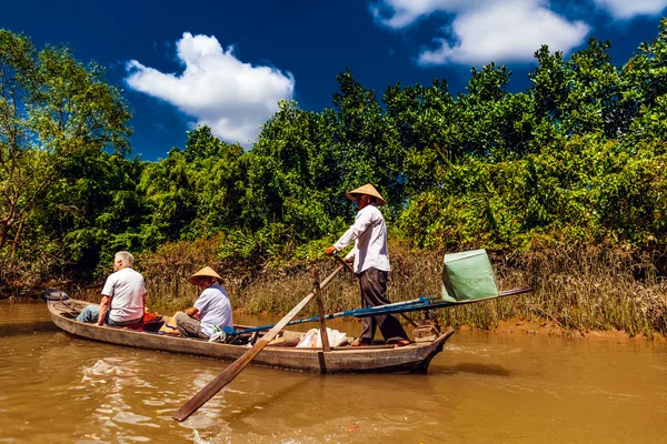 HO CHI MINH, VIETNAM - JAN 15, 2016: Life of the Vietnamese people on the Mekong River in Hochiminh (Saigon). Saigon is the largest city in Vietnam