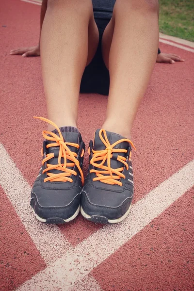 Sport shoes on track