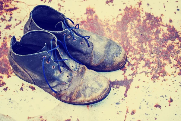 Old dirty cowboy boots