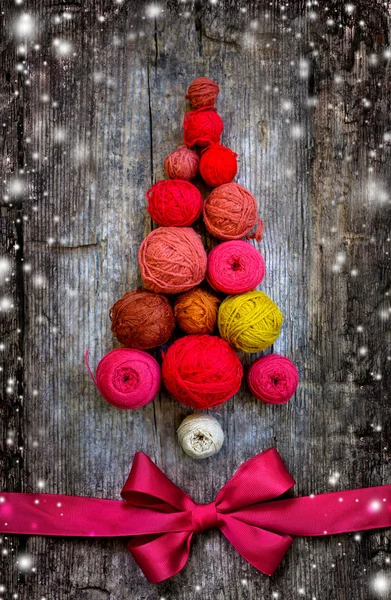 Christmas tree shaped by balls of yarn