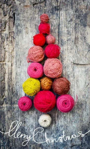 Christmas tree shaped by balls of yarn