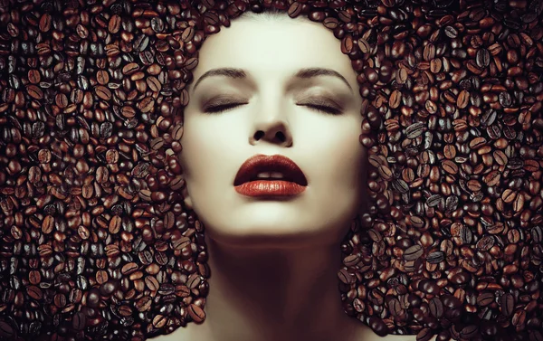 Coffee beans. Girl in the coffee beans