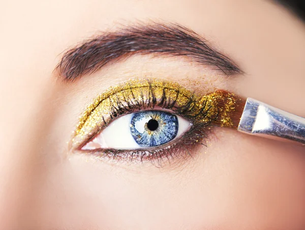 Eye Makeup. Beautiful Eyes Glitter Make-up. Holiday Makeup detail