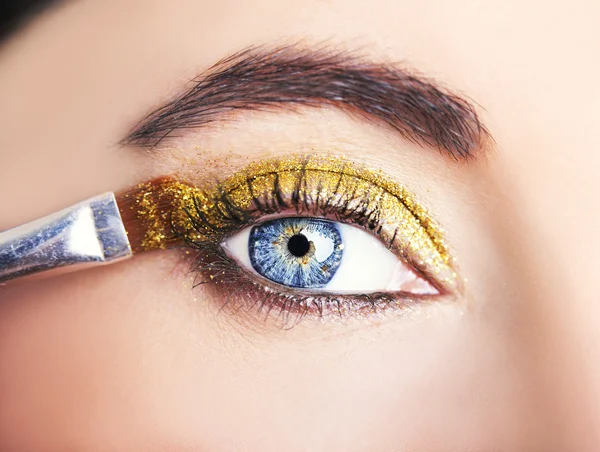 Eye Makeup. Beautiful Eyes Glitter Make-up. Holiday Makeup detail