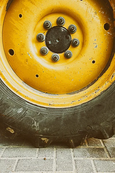 Close up to big heavy tire and wheel
