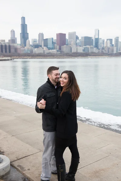 Happy engaged couple outdoors