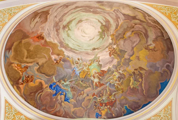 BANSKA STIAVNICA, SLOVAKIA - FEBRUARY 5, 2015: The fresco of Christ in the glory of heaven scene on the cupola of parish church from 18. cent. by unknown artist.