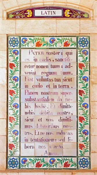 JERUSALEM, ISRAEL - MARCH 3, 2015: The Latin Lord\'s prayer in atrium of Church of the Pater Noster on Mount of Olives.