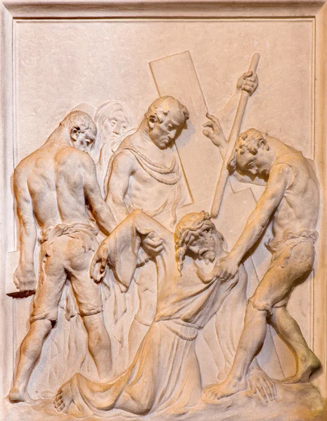 BRUSSELS, BELGIUM - JUNE 15, 2014: Stone relief of Jesus fall under the cross in church Notre Dame du Bon Secource (The Church of Our Lady of Assistance).