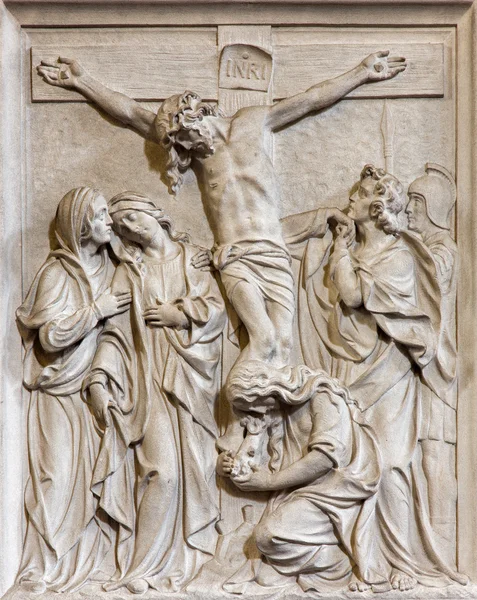 BRUSSELS, BELGIUM - JUNE 15, 2014: Stone relief the Crucifixion of Jesus scene in church Notre Dame du Bon Secource.