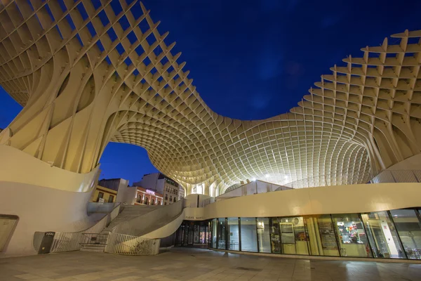 SEVILLE, SPAIN - OCTOBER 28, 2014: Metropol Parasol wooden structure located at La Encarnacion square, designed by the German architect Jurgen Mayer Hermann and completed in April 2011.
