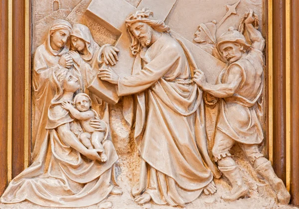 VIENNA, AUSTRIA - DECEMBER 17, 2014: Jesus meet the women of Jerusalem. Relief as one part of Cross way cycle in Sacre Coeur church by R. Haas from end of 19. cent. Jesus meet the women of Jerusalem