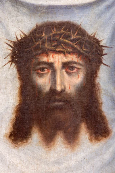 GRANADA, SPAIN - MAY 31, 2015: The face of Jesus Christ paint as the detail of pant \