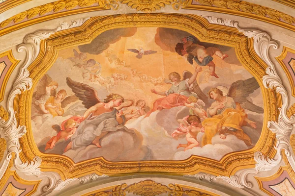 ROME, ITALY - MARCH 26, 2015: The ceiling fresco of Angels with the Holy Spirit  from begin of 17. cent. in church Chiesa di Santa Maria in Transpontina and chapel of Pieta.