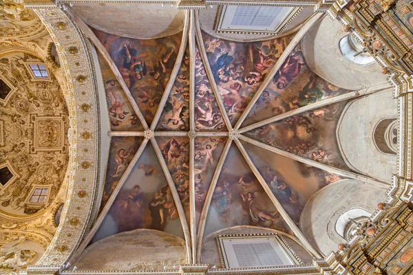 CORDOBA, SPAIN - MAY 26, 2015: The ceiling of presbytery in church Iglesia de San Augustin with the fresco of angels from 17. cent. by Cristobal Vela and Juan Luis Zambrano.