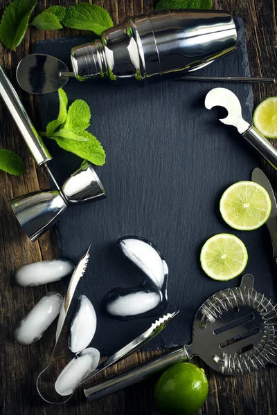 Set of bar accessories and ingredients for making a cocktails