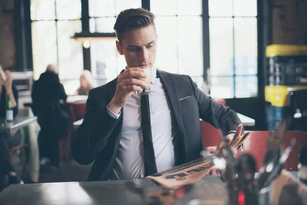 Single man drinking coffee