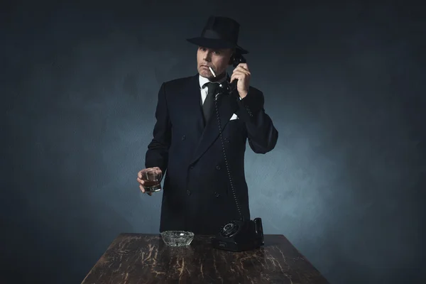 Retro 1940 businessman on the phone