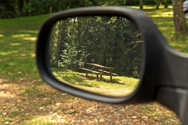 Picnic Table in Mirror of Car