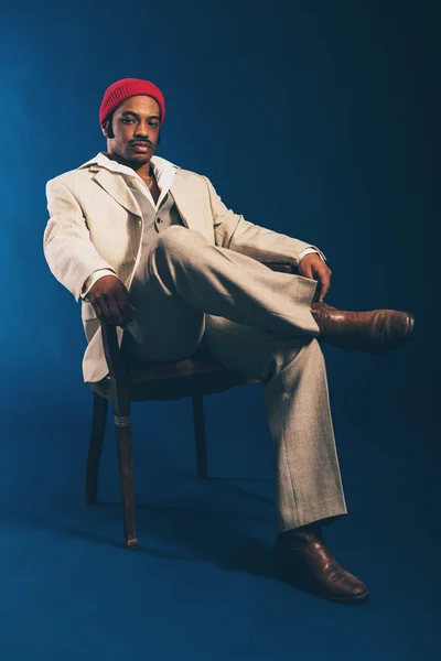 Sitting Afro Man in Formal Wear