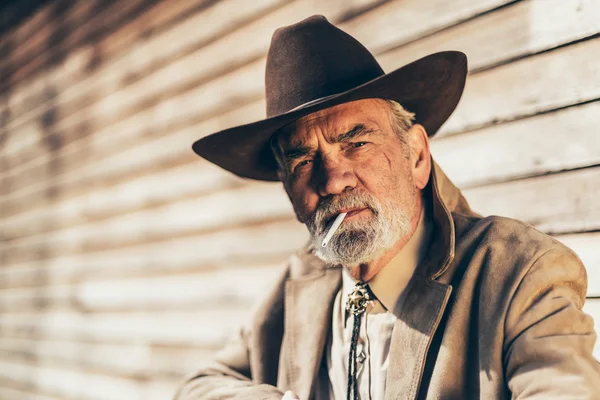 Senior man smoking a cigarette