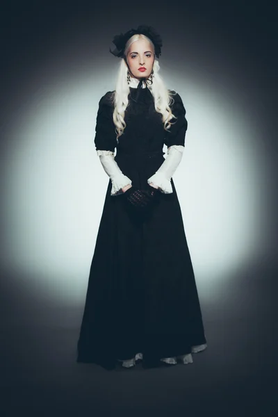 Woman with White Hair in Black Gown