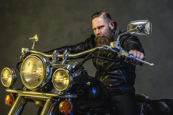 Gorgeous Bearded Man Riding on his Motorcycle