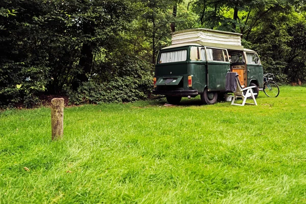 Vintage Camping Van on Meadow