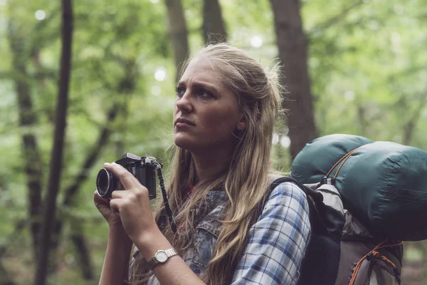 Observing woman in forest