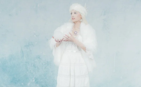 Snow Queen Holding Snow Ball.