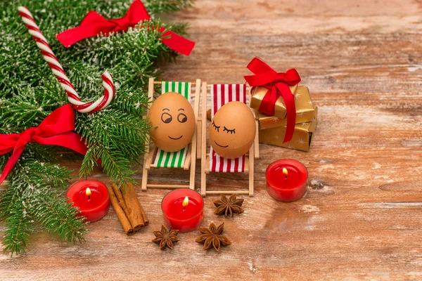 Funny eggs, Christmas, mandarin, gift and candles