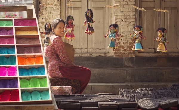 KATHMANDU, NEPAL - NOVEMBER 19: Unkown woman selling condiments