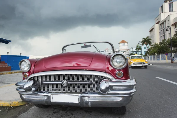 HAVANA,CUBA-OCTOBER 14:People and old car on streets of Havana O
