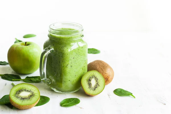 Healthy green smoothie in jar.