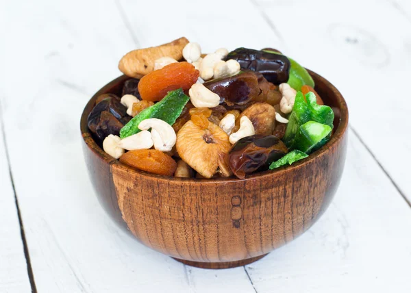 Dried fruits in a wooden bowl