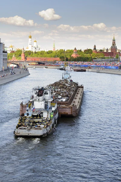 Transportation of scrap metal on a barge on Moscow River.