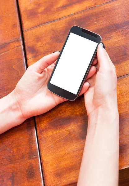 Close-up of lady hands holding smartphone blank screen
