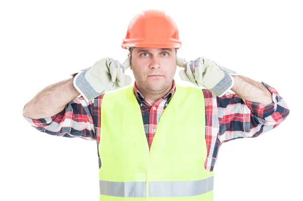 Hear no evil concept with attractive male builder