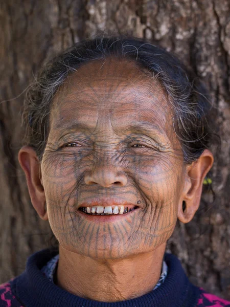 Portrait tribe tattooed Chin woman. Mrauk U, Myanmar