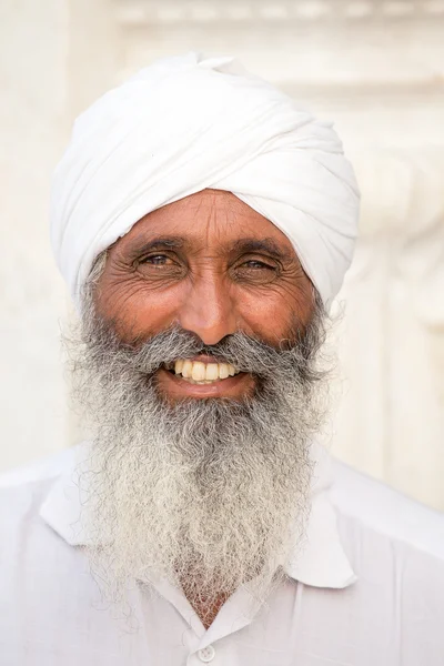 Sikh man visiting the Golden Temple in Amritsar, Punjab, India.
