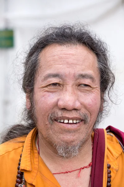 Old Tibetan Buddhist monk in the Dharamsala, India