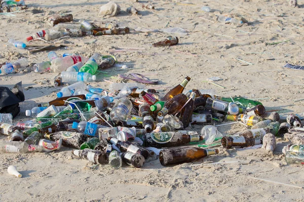 Consequences of coast pollution on the Haad Rin beach after the full moon party on island Koh Phangan. Thailand