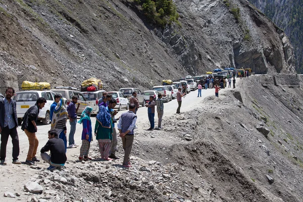 Cars with passengers stuck at the pass on the way Srinagar - Leh, Himalayas. India