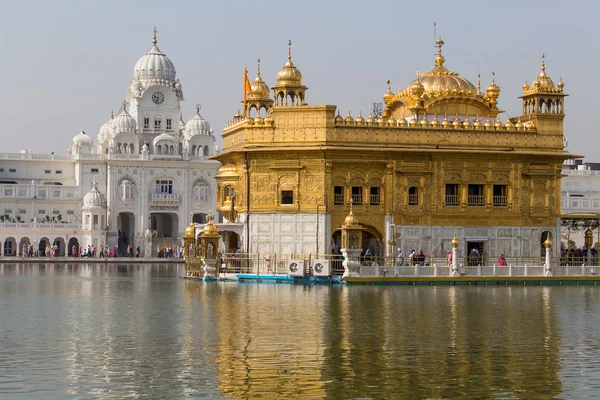 Sikhs and indian people visiting the Golden Temple in Amritsar, Punjab, India.