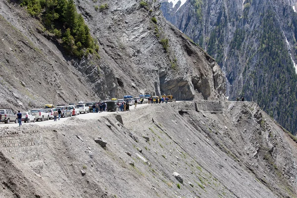 Cars with passengers stuck at the pass on the way Srinagar Leh, Himalayas. India
