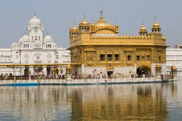 Sikhs and indian people visiting the Golden Temple in Amritsar, Punjab, India.