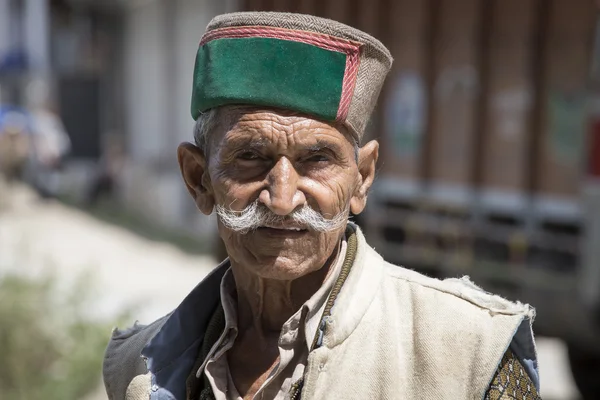 Portrait local old man in Manali, India