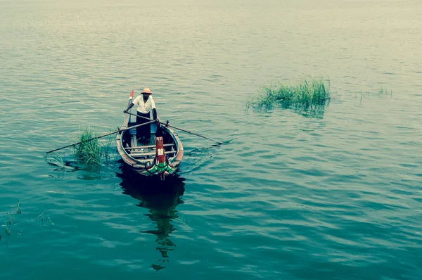 Man in boat at Myanmar
