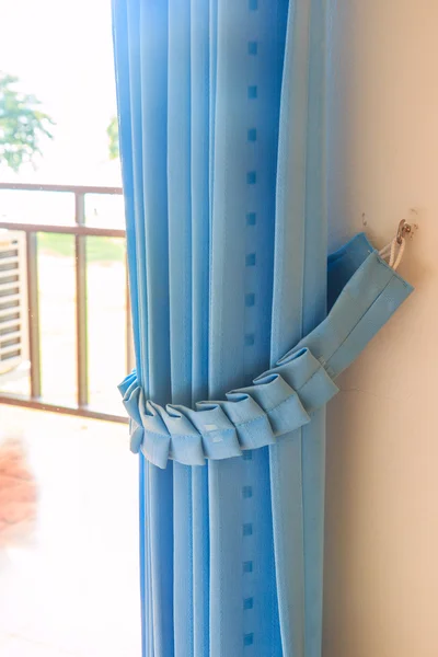 Blue window curtain